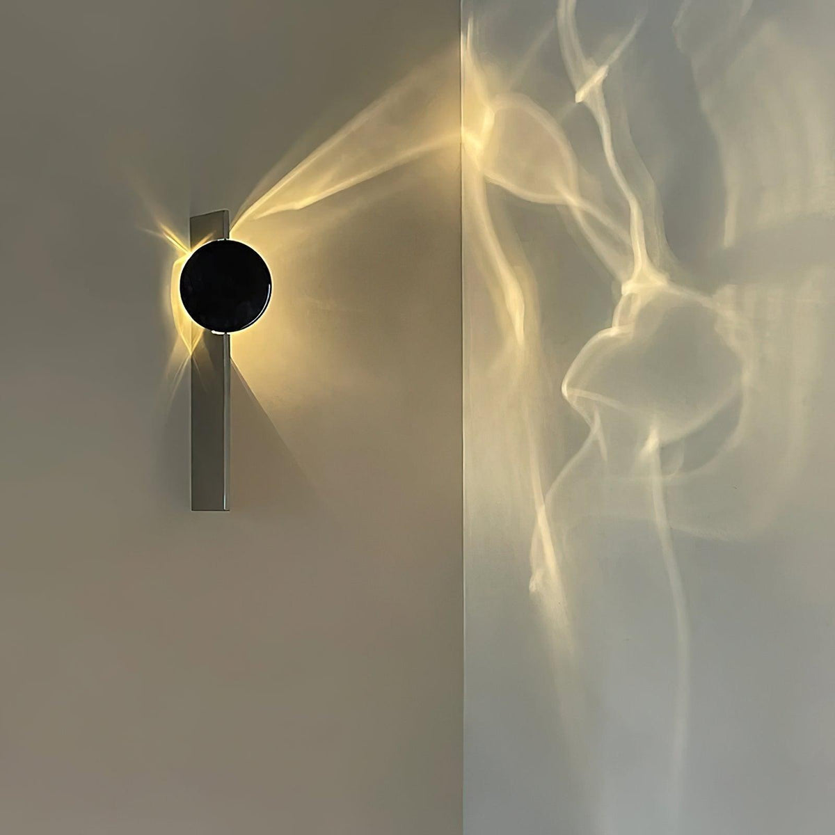 applique-murale-interieur-rond-avec-faisceaux-lumineux-moderne-led-chambre-3