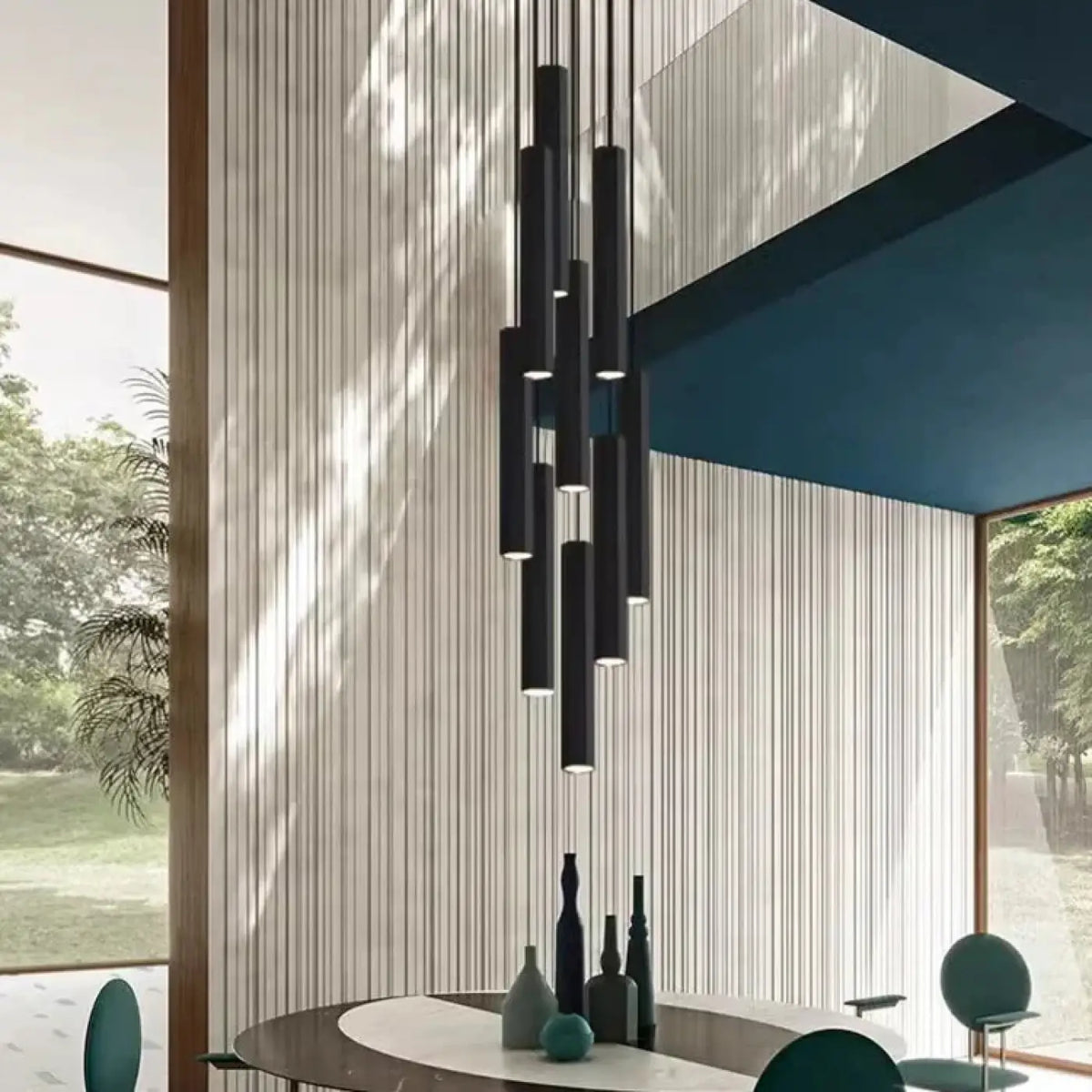 Suspension luminaire escalier design cylindres noirs