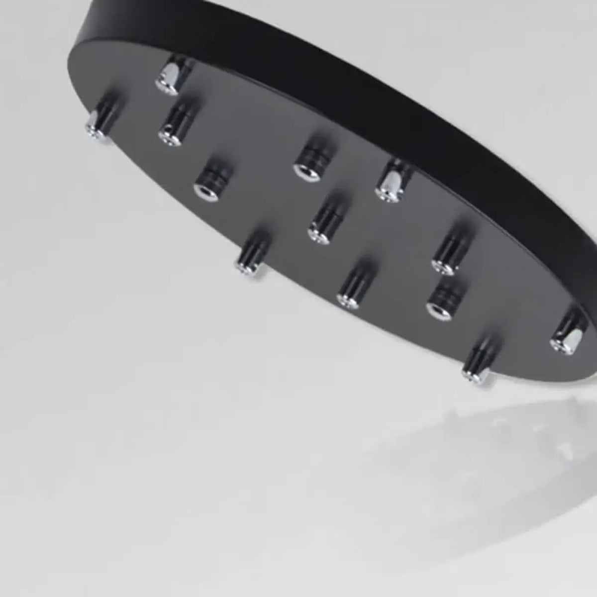 Suspension luminaire escalier design cylindres noirs