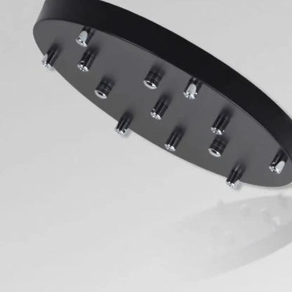 Suspension luminaire escalier design cylindres noirs