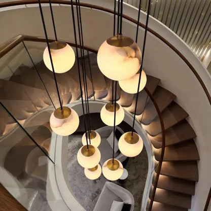 Suspension luminaire escaliers boule verre marbre