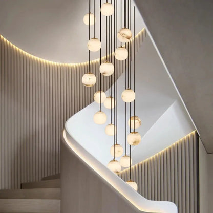 Suspension luminaire escaliers boule verre marbre