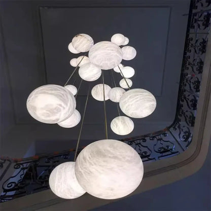 Suspension luminaire escaliers boule verre marbre