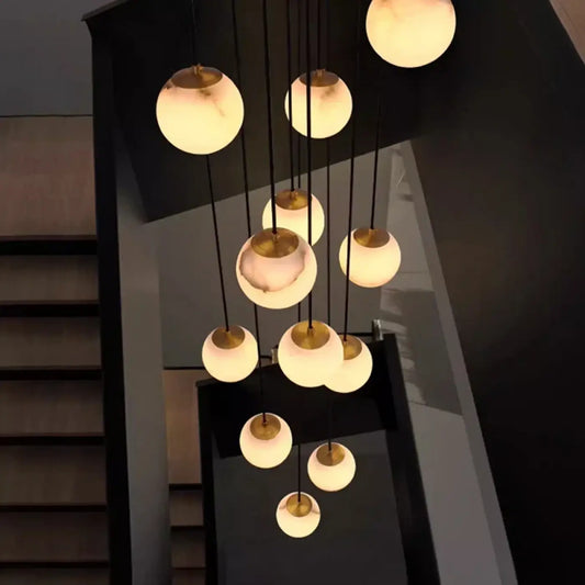 Suspension luminaire escaliers boule verre marbre