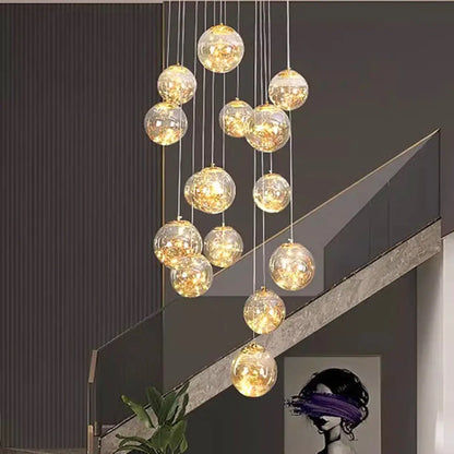 Suspension luminaire escaliers boules cristal dorees