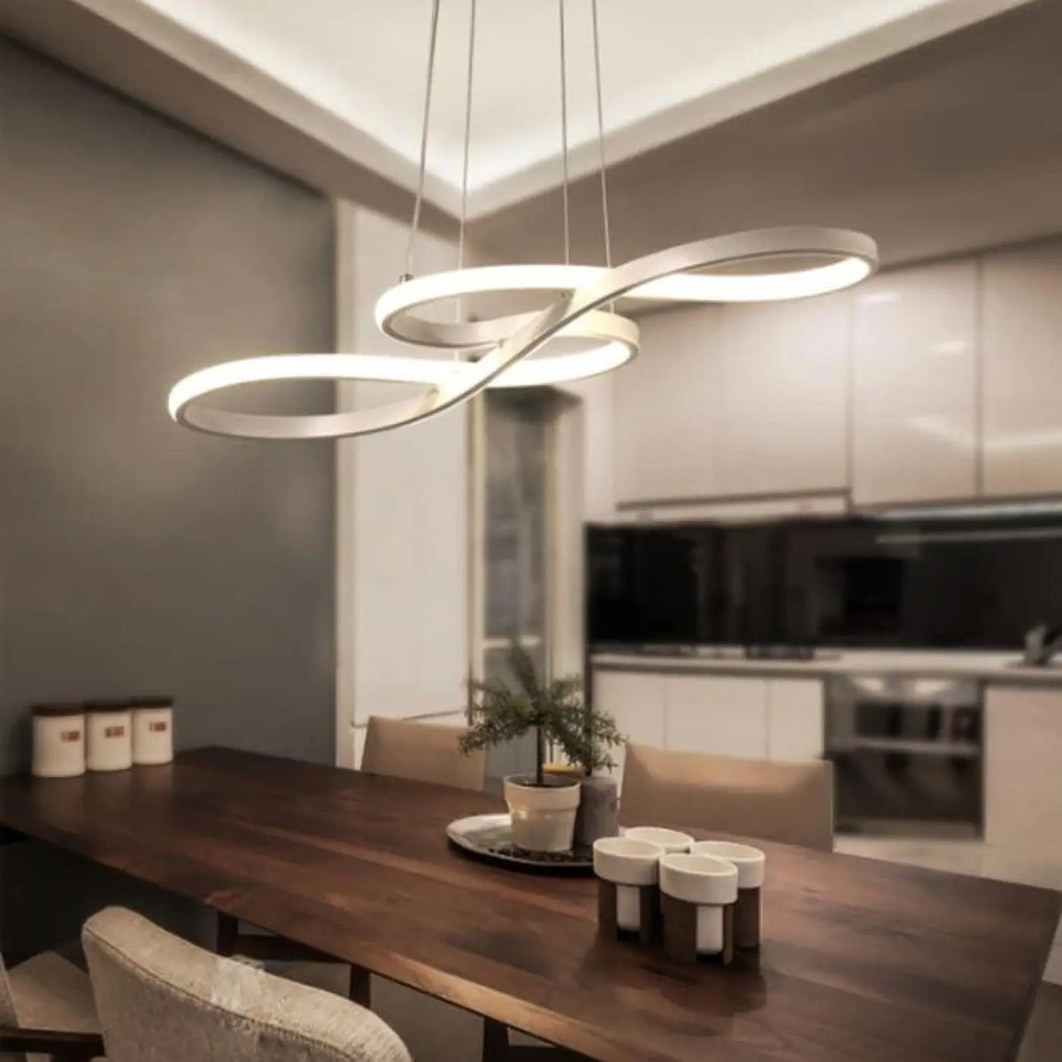 Suspension luminaire salle a manger design courbes LED