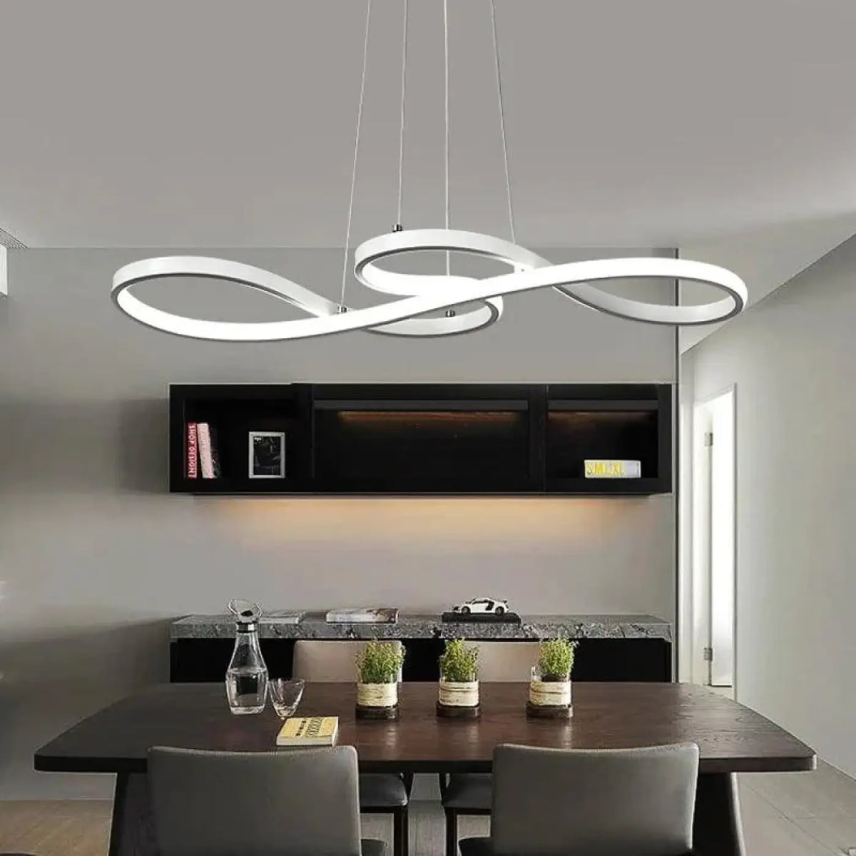 Suspension luminaire salle a manger design courbes LED